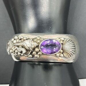 Carol Felley Sterling cuff bracelet, ocean themed with a single oval Amethyst